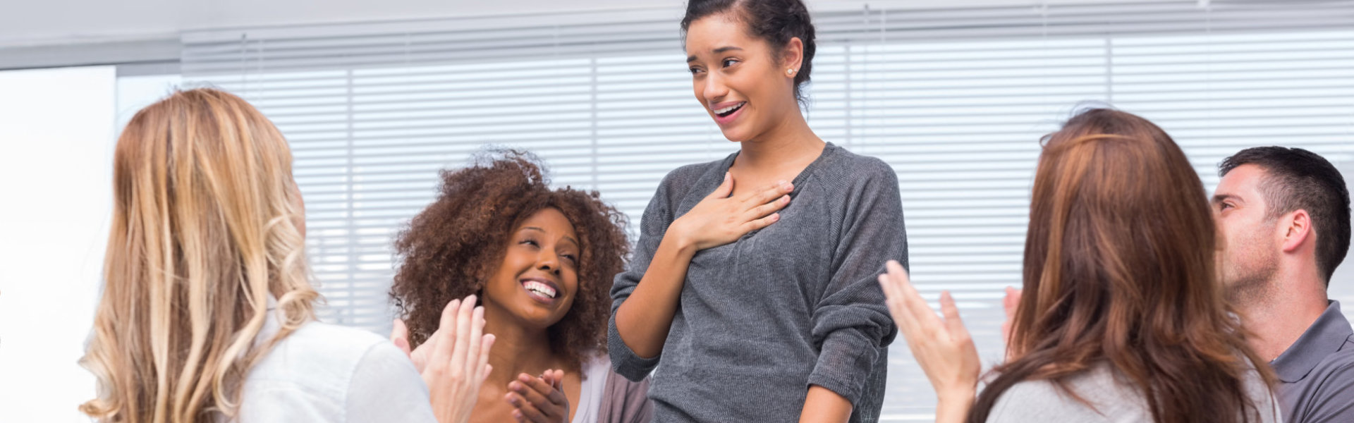 woman standing in group session